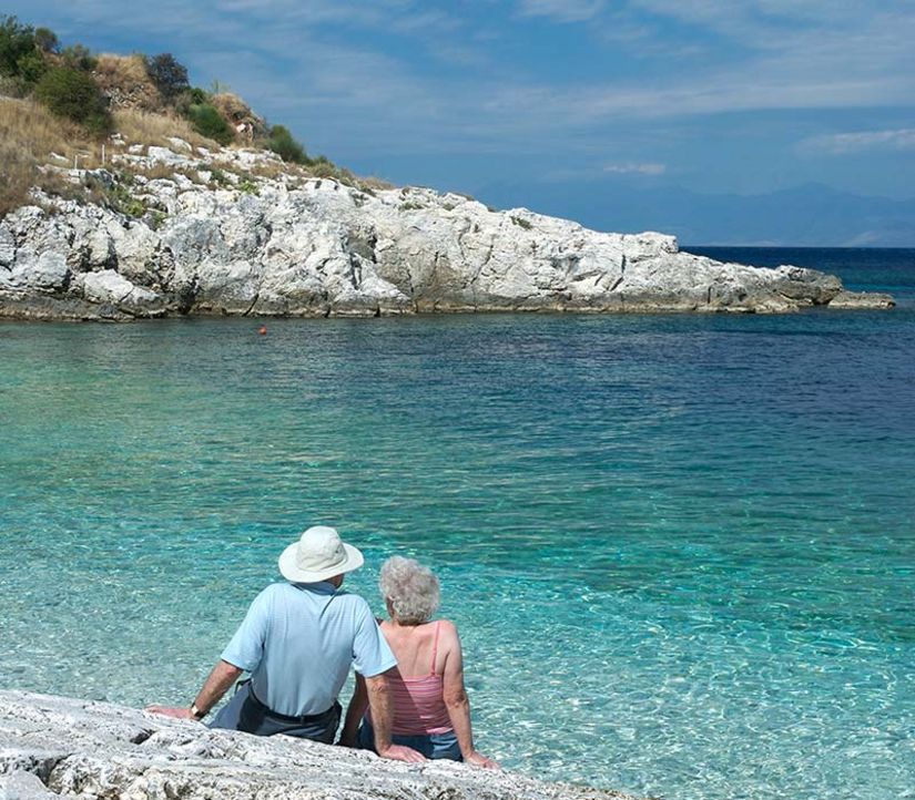 Couple sitting on a beach
