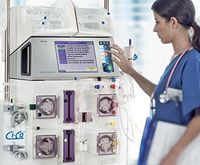 Nurse operating multiFiltrate Acute Therapy System