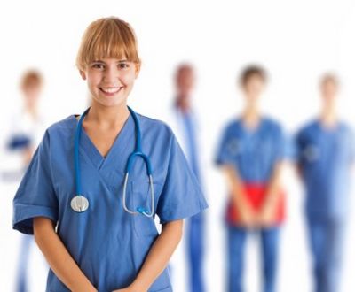 Nurse and doctor training a peritoneal dialysis patient